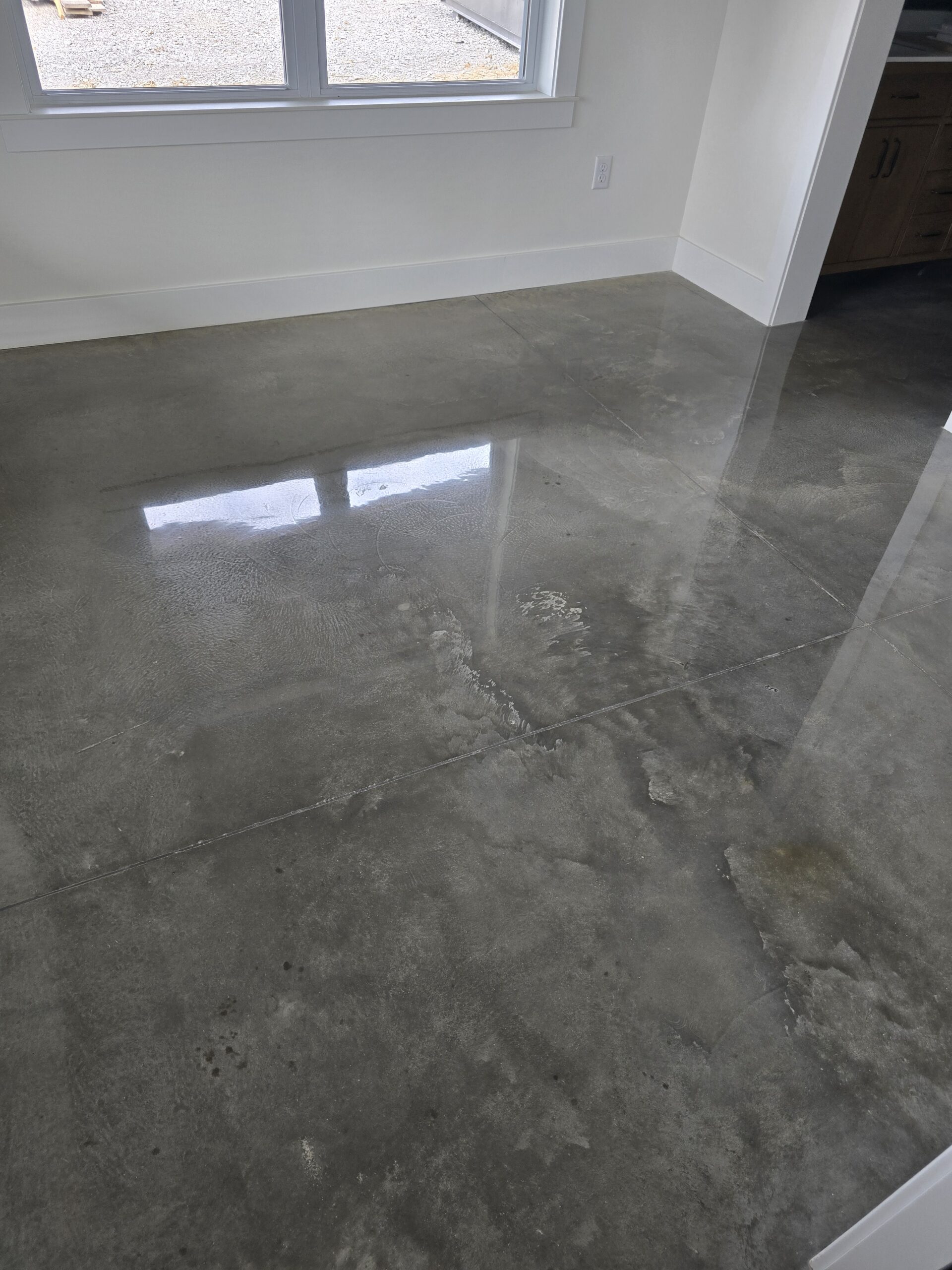 Decorative concrete floor with a marbled stained finish